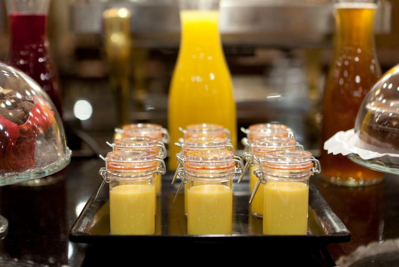 Hotel Agumar Madrid Exterior foto Orange juice